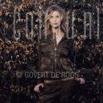 10-04-2003 Maria Kooistra at home in Muiderberg.

[keywords]Posed, Half Lenght, Eyecontact, Autum leaves[/keywords]